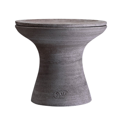 Concrete-finished Bergs Potter planter with matching saucer on top on a white background