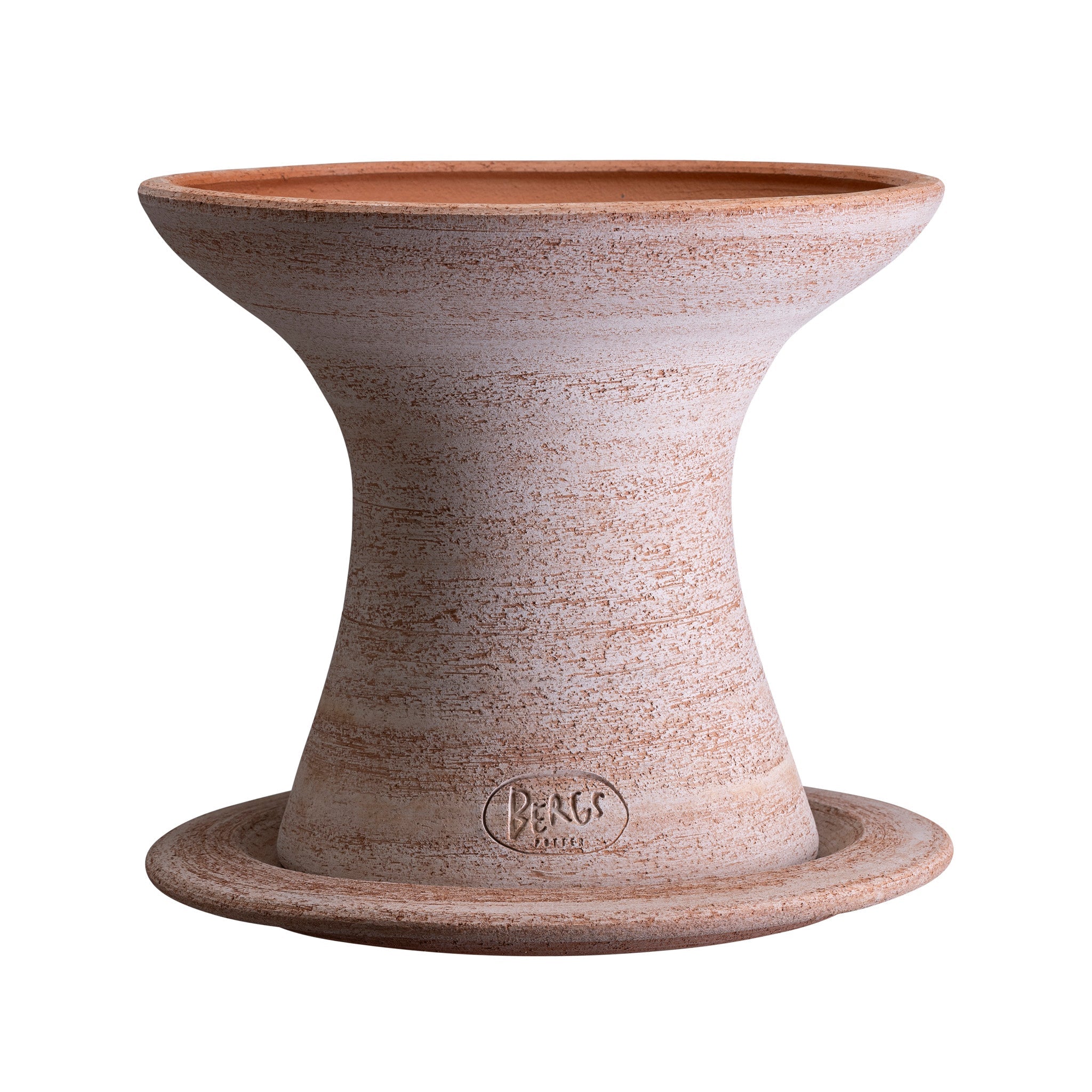 Raw terracotta Bergs Potter planter sitting on matching saucer with a textured surface on a white background
