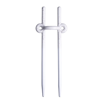 White glossy-finished two-pronged plant support stake on white background