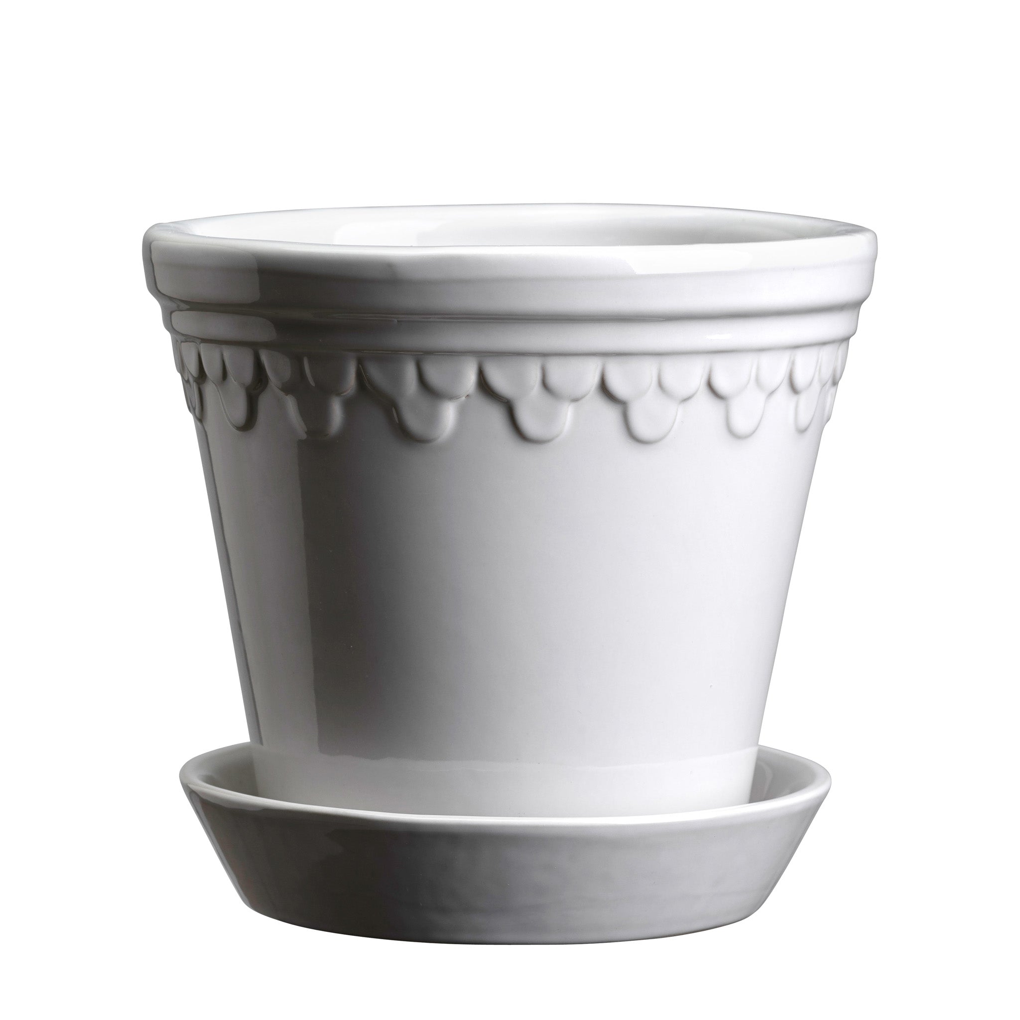 White glaze-finish ceramic Bergs Potter pot with matching saucer