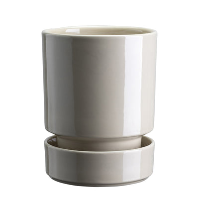 Off-white glaze-finish Bergs Potter pot and matching saucer