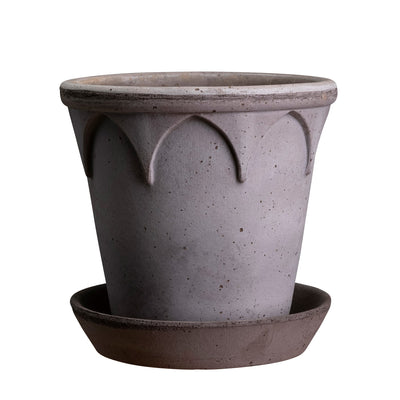 Ceramic Bergs Potter planter in stone grey colour with decorative rim on a white background